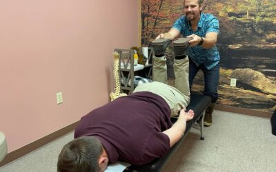 Chiropractic leg adjustment for ice injury recovery at Happy Family Chiropractic in Juneau Alaska